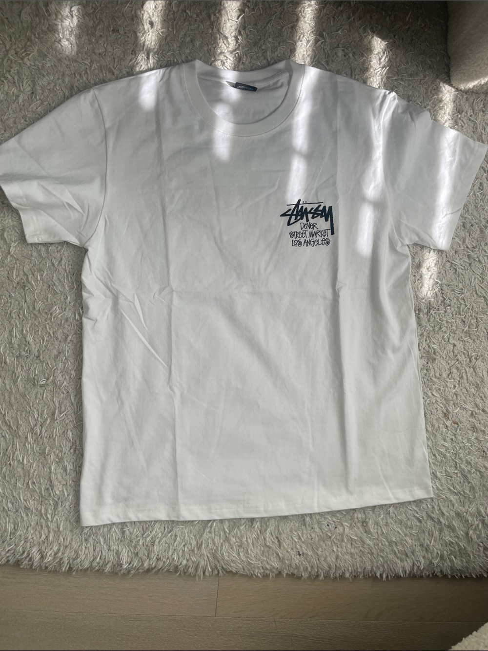 Stussy White Crewneck Tee with Black Chest Logo